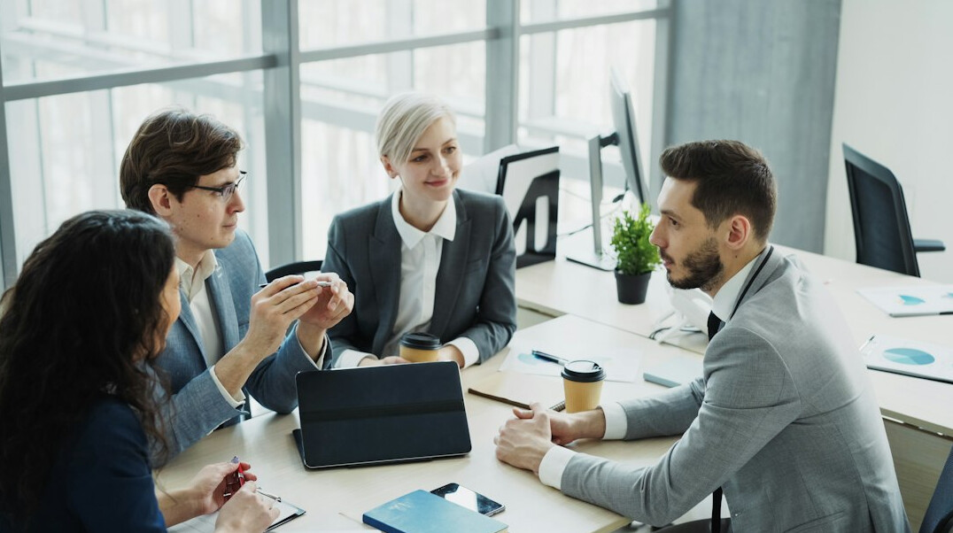 business team discussing conflict