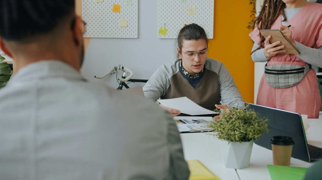 business team discussing conflict