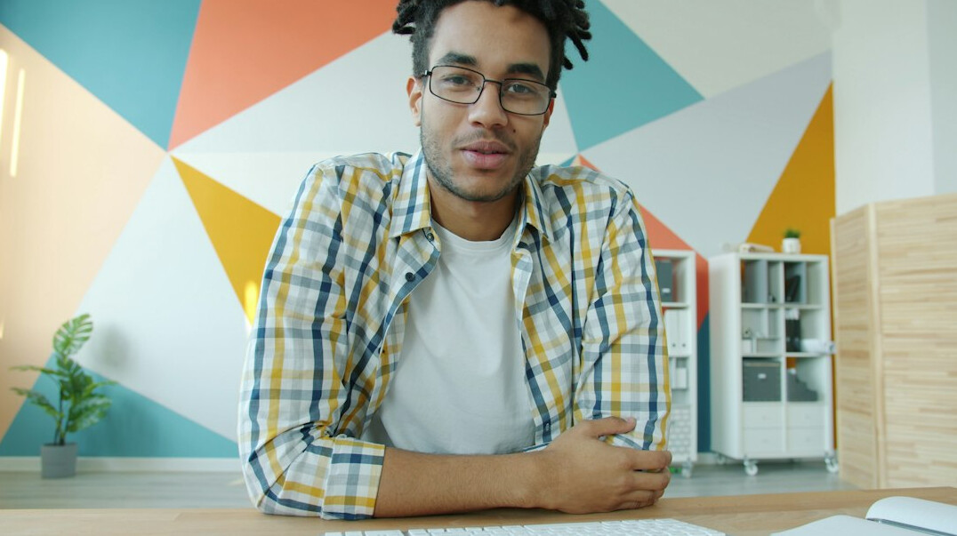 confident businessman at desk