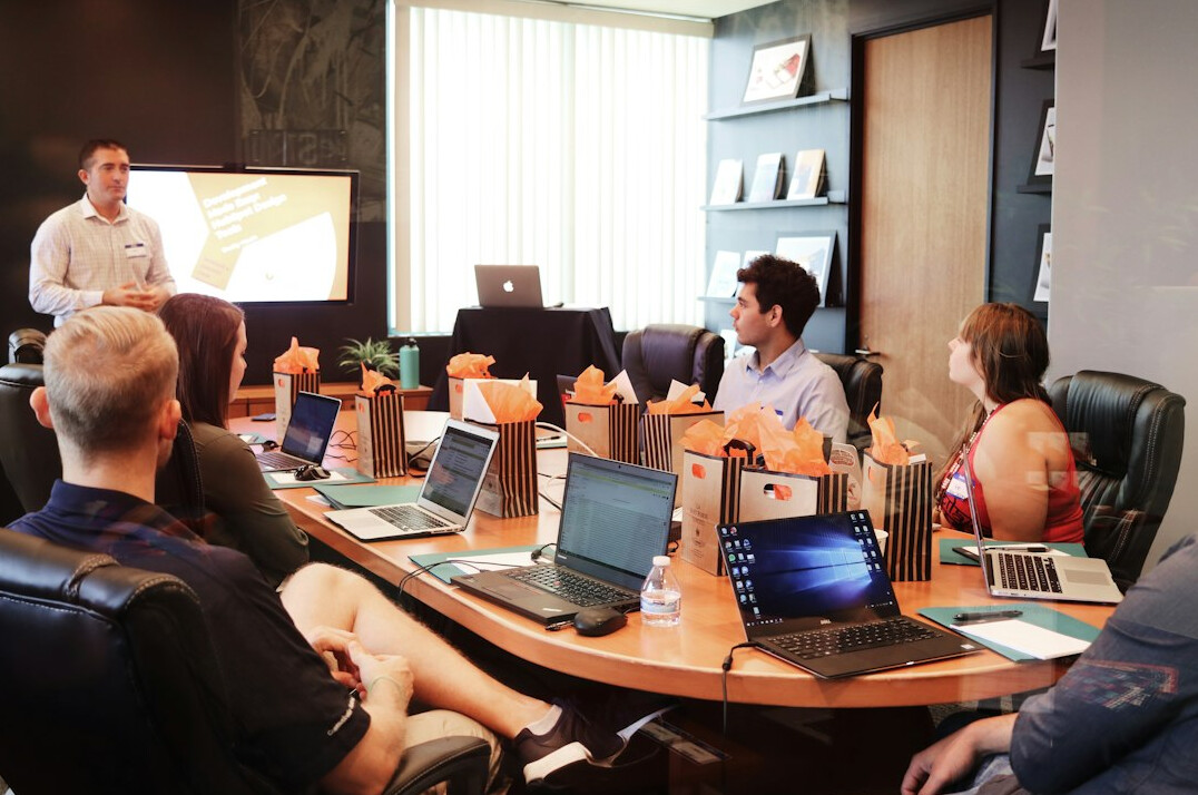 manager leading meeting